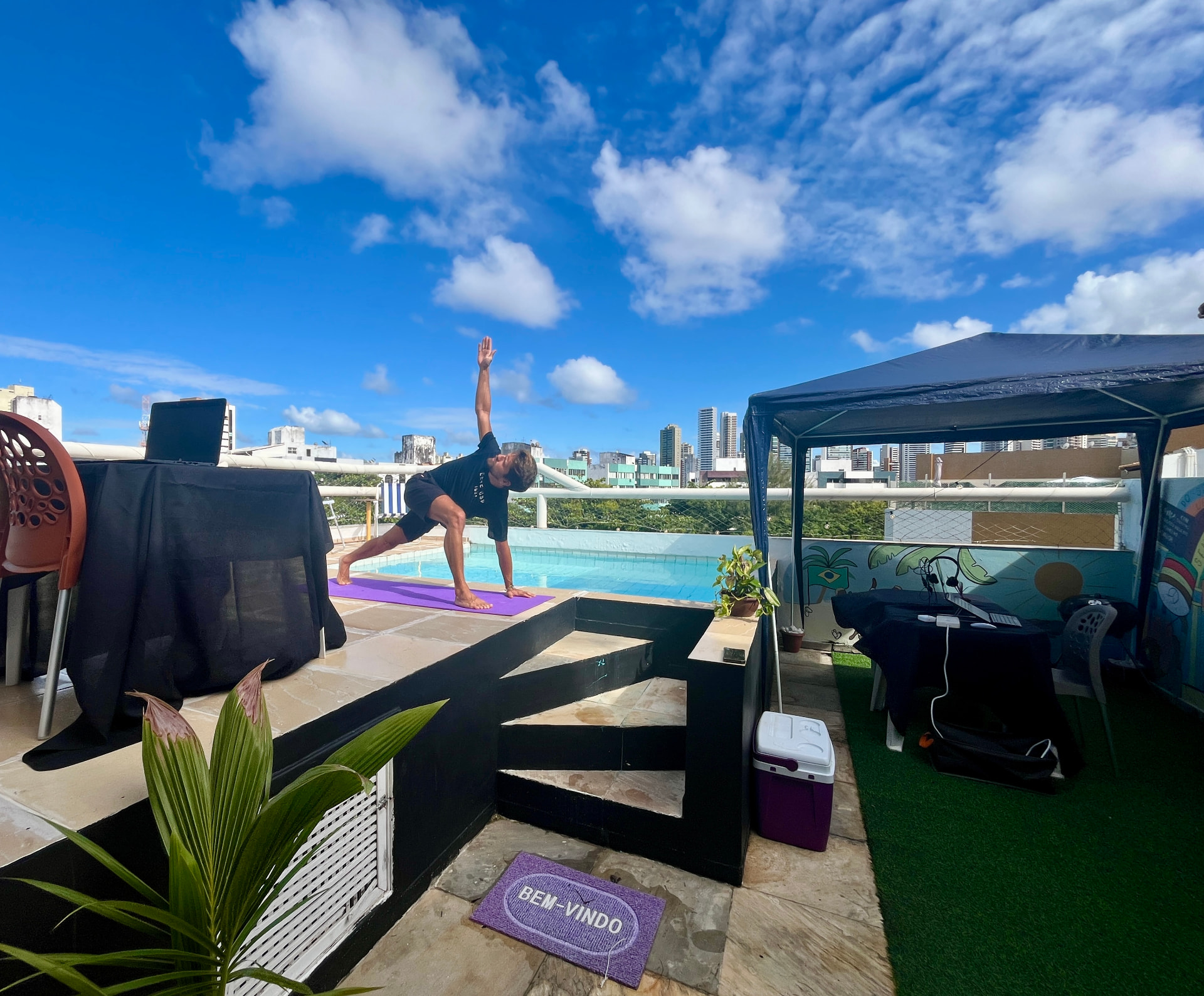 Morning wellness session by the rooftop pool