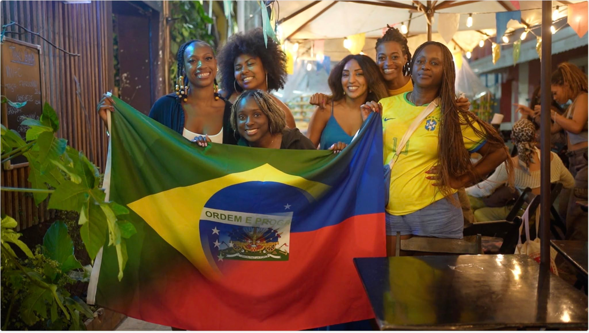 Football watch party with Brazil and Haiti flags